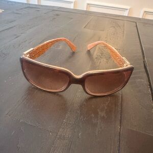 Coach Daphne Sunglasses: a few scratches on lenses but still in good shape